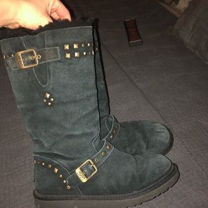 Black uggs with gold hardware detail
